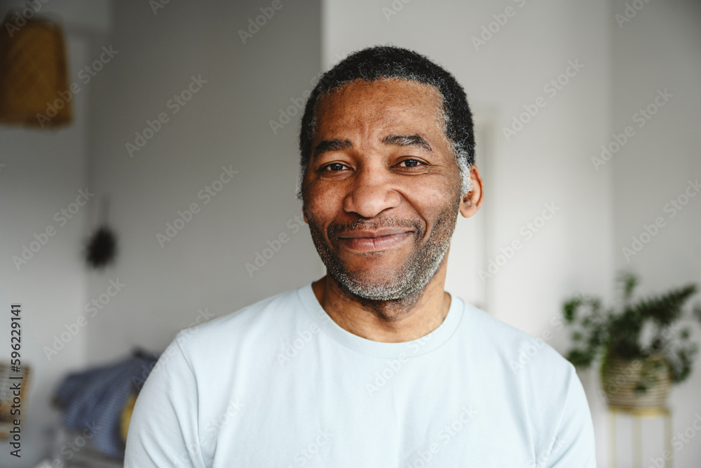 Smiling mature man at home Smiling mature man at home