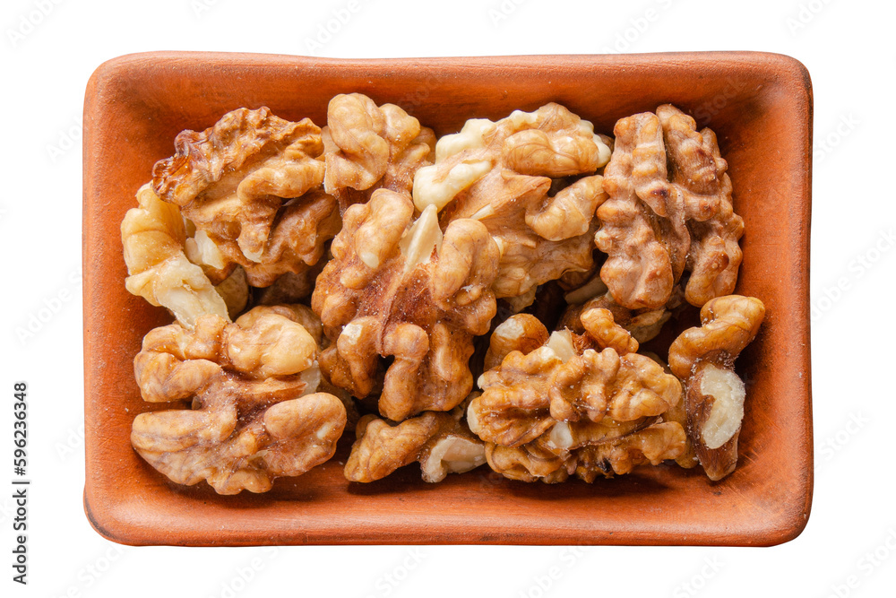 Walnuts in clay bowl isolated on white flat lay view Walnuts in clay bowl isolated on white flat lay view