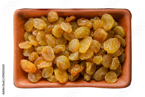 Raisins in clay bowl isolated on white flat lay view