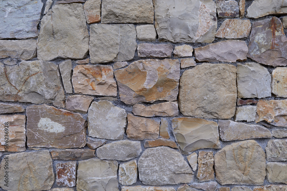 Beautiful wall made with dry stone typical of southern Europe and Mediterranean areas Beautiful wall made with dry stone typical of southern Europe and Mediterranean areas