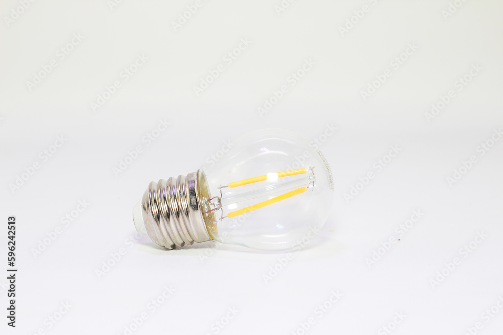 Small light bulb isolated on white background. Small light bulb isolated on white background.