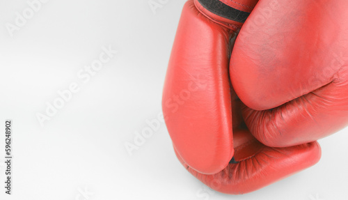 Red boxing gloves on a white background.