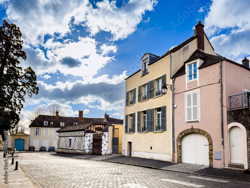 Antique building view in Montfort, France © ilolab