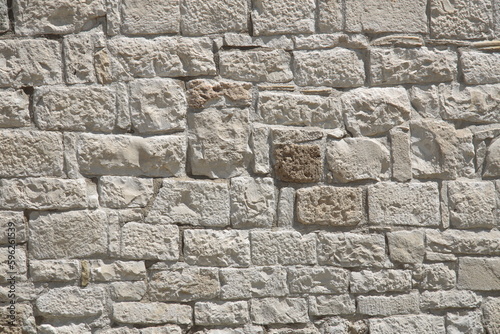 ancient white stone wall of a house