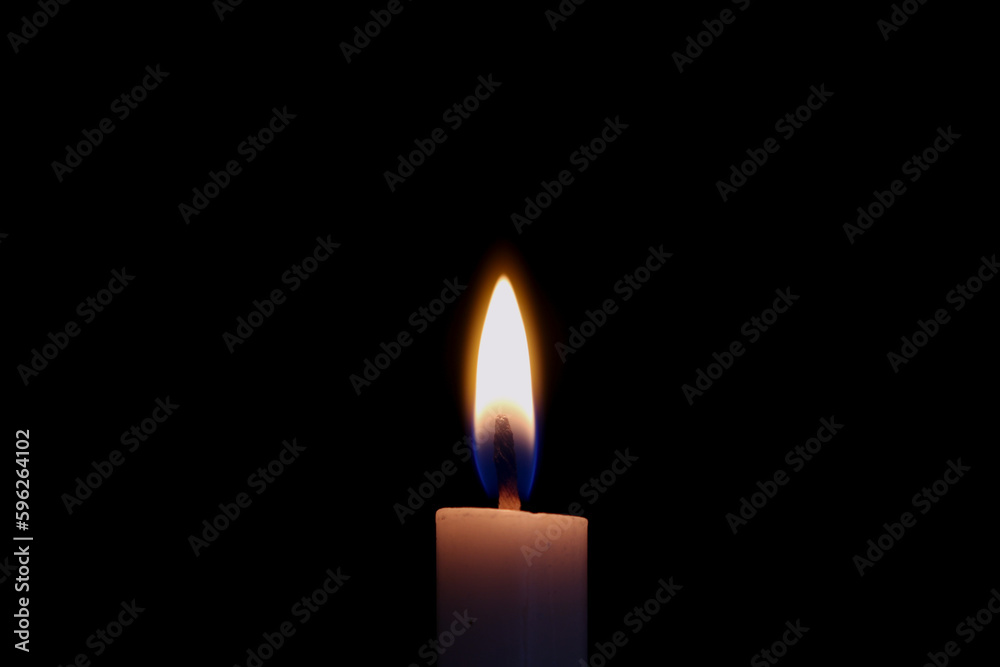 Candle flame close up on a black background Candle flame close up on a black background