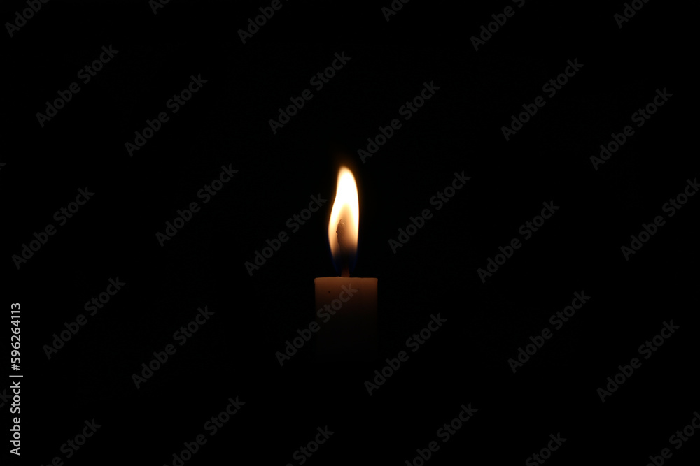 Candle flame close up on a black background Candle flame close up on a black background