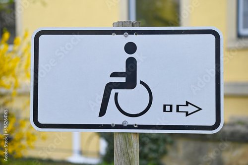 Parking for disabled people only. Wheelchair has priority