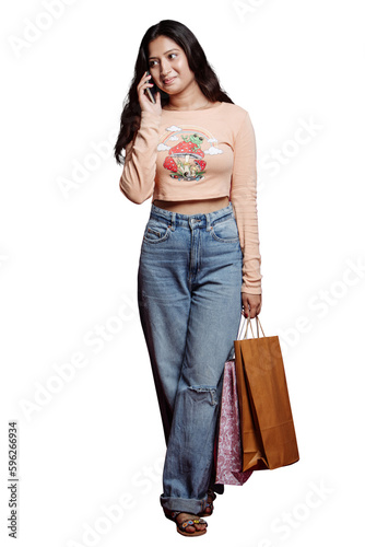 Beautiful Indian Girl Shopping Stylish Indian Girl Chatting on Phone with Shopping Bags in Mall. An Excited Fashionista Stylish Cheerful Young Girl Chatting on Phone, With Shopping Bags isolated PNG