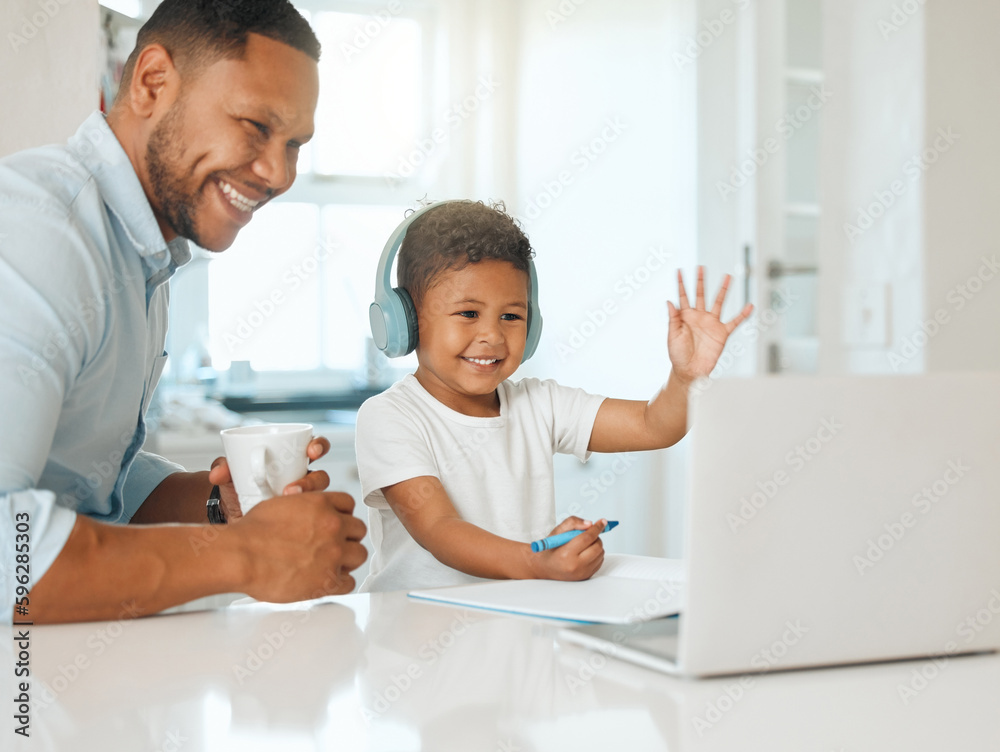 Fototapeta premium Hes ready to learn. Shot of a father and son doing homework together at home.