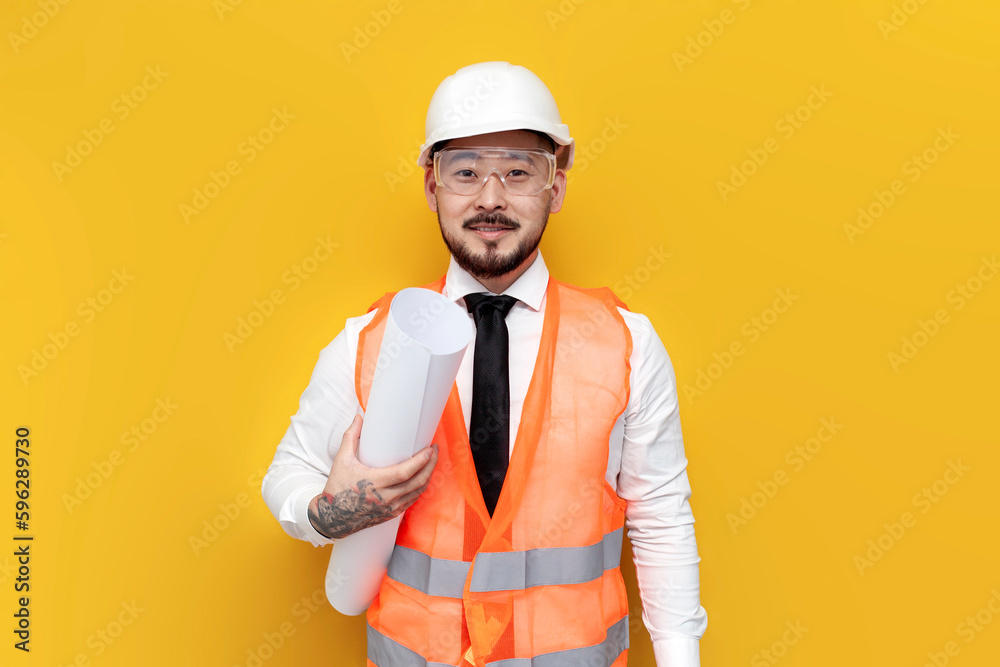 asian foreman in uniform with papers and projects on yellow isolated background, korean civil engineer in hardhat asian foreman in uniform with papers and projects on yellow isolated background, korean civil engineer in hardhat