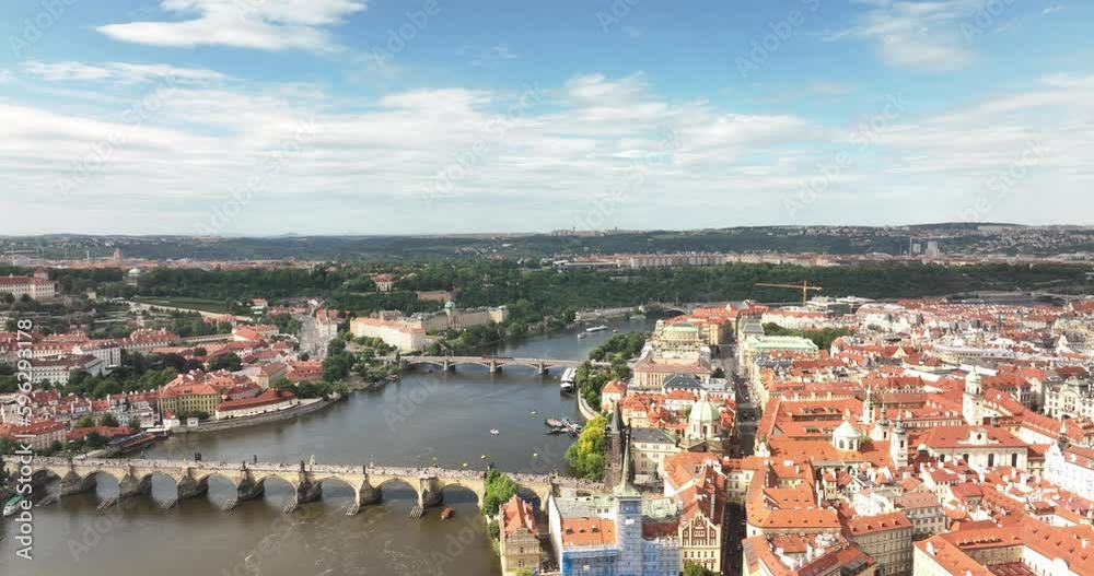 Prague scenic aerial view. Prague architecture and bridge over Vltava river. Prague, Czechia, Czech Republic. Panoramic view from above on the Prague center, cityscape. Prague scenic aerial view. Prague architecture and bridge over Vltava river. Prague, Czechia, Czech Republic. Panoramic view from above on the Prague center, cityscape.
