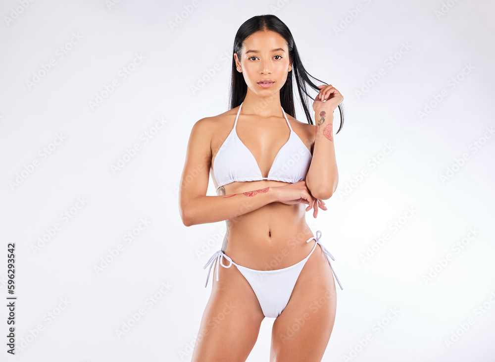 Come on and haunt me. Studio portrait of a beautiful woman posing in her underwear against a white background. Come on and haunt me. Studio portrait of a beautiful woman posing in her underwear against a white background.
