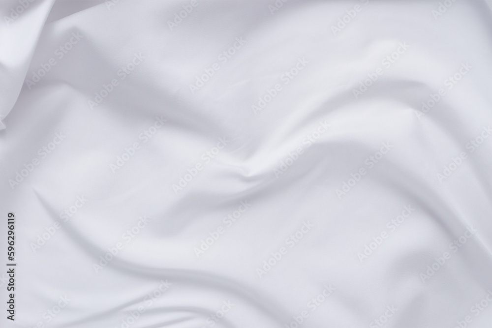 White fabric. luxurious white fabric texture background. Creases of satin, silk and cotton.