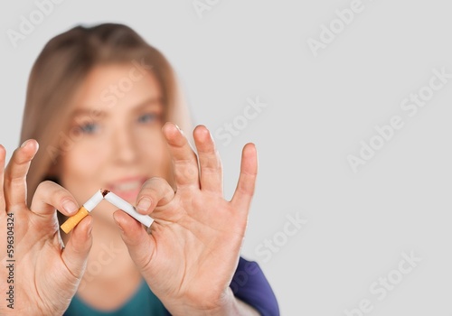 Stop smoking concept, Hand with broken cigarette