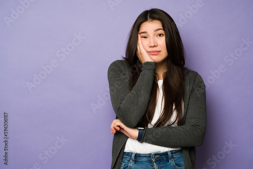Tired woman feeling bored and annoyed