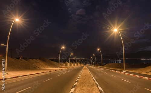 Night and street lamps on the longest street in Eilat - famous tourist resort...