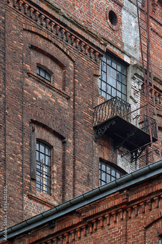 Abandoned neglected red brick buildings of the great textile industry in Lodz