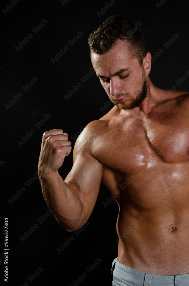 Young handsome guy on a diet. A man with a beautiful athletic body. Young handsome guy on a diet. A man with a beautiful athletic body.