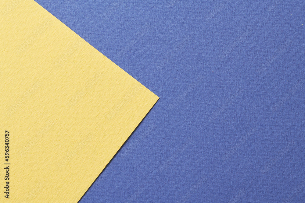 Rough kraft paper background, paper texture blue yellow colors. Mockup with copy space for text Rough kraft paper background, paper texture blue yellow colors. Mockup with copy space for text