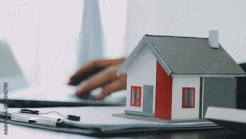 Wallpaper Mural Female woman hands holding home model, small miniature white toy house. Mortgage property insurance dream moving home and real estate concept.. Torontodigital.ca