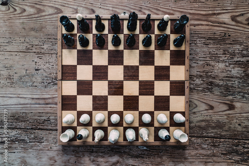Chess set on†checkerboard photo