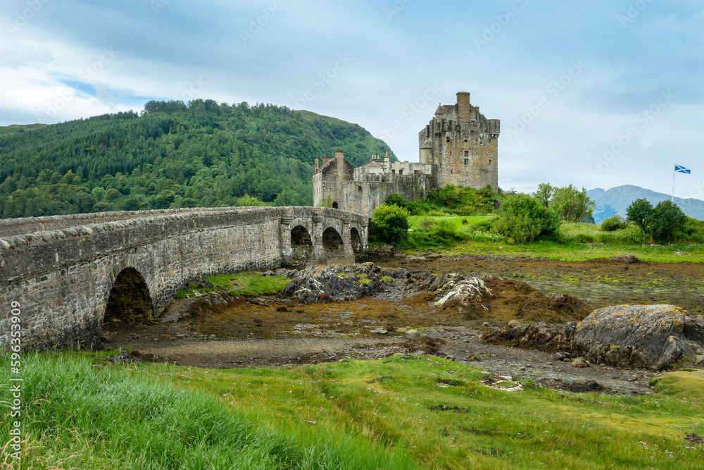 Eilean Donan castle at low tide in North West Highlands, Scotland, UK.