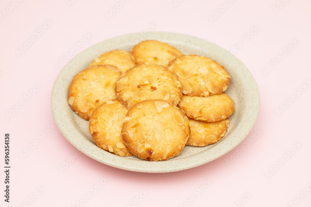 Few homemade cookies with almond on small dish