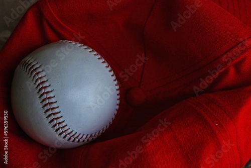 Baseball ball on a dark red background