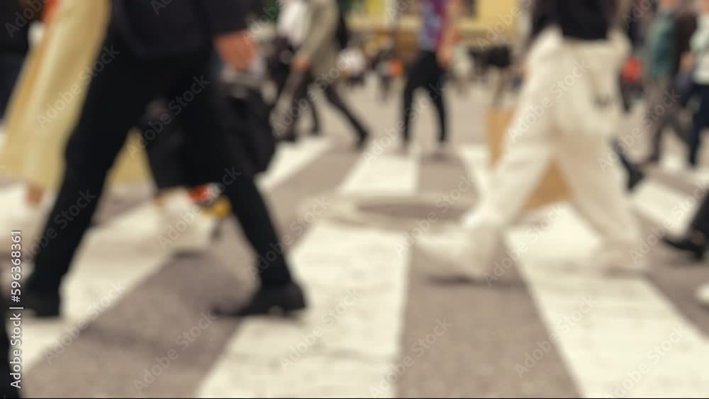 Many pedestrians crossing on the road, Shibuya in Tokyo in Japan, Business or people, Blurred, Slow motion, Gimbal used Many pedestrians crossing on the road, Shibuya in Tokyo in Japan, Business or people, Blurred, Slow motion, Gimbal used