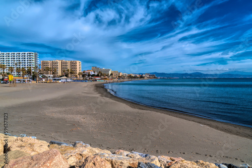 Playa de Fuente Salud beach next to Benalmadena Marina view to Carihuela and Torremolinas Spain photo