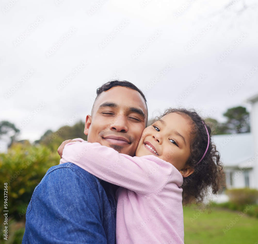 She gives the best hugs. Shot of a young father and daughter spending time in nature. She gives the best hugs. Shot of a young father and daughter spending time in nature.