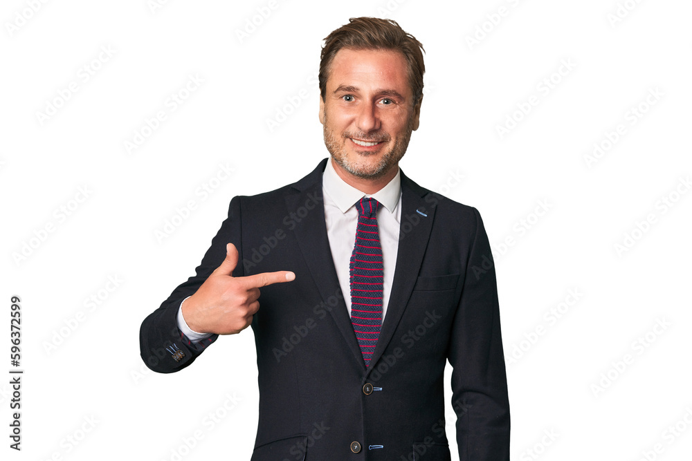 A middle-aged businessman isolated person pointing by hand to a shirt copy space, proud and confident A middle-aged businessman isolated person pointing by hand to a shirt copy space, proud and confident