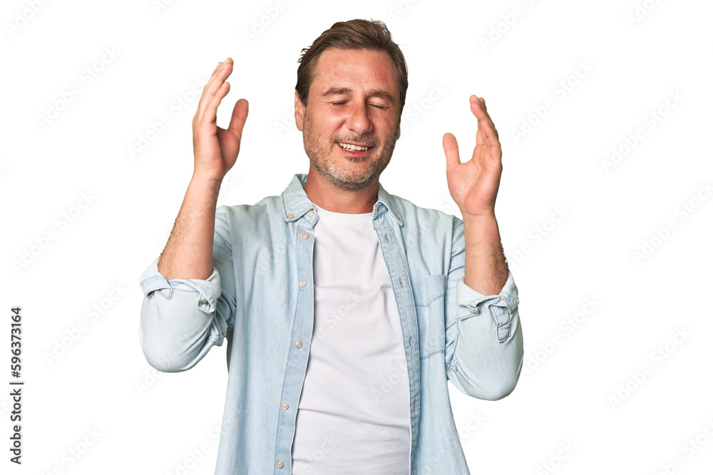 Fototapeta premium A middle-aged man isolated joyful laughing a lot. Happiness concept.