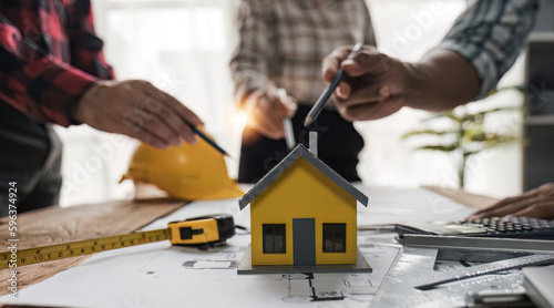 close up view of business people having consultation about wind energy at company office.