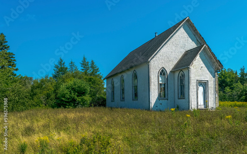 Abandoned Church in the countryside of rural Nova Scotia on a sunny summer's evening.