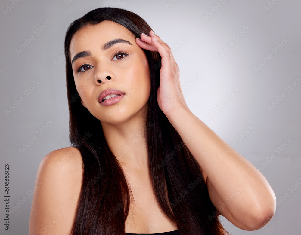 Channel your inner diva. Studio portrait of an attractive young woman posing against a grey background. Channel your inner diva. Studio portrait of an attractive young woman posing against a grey background.