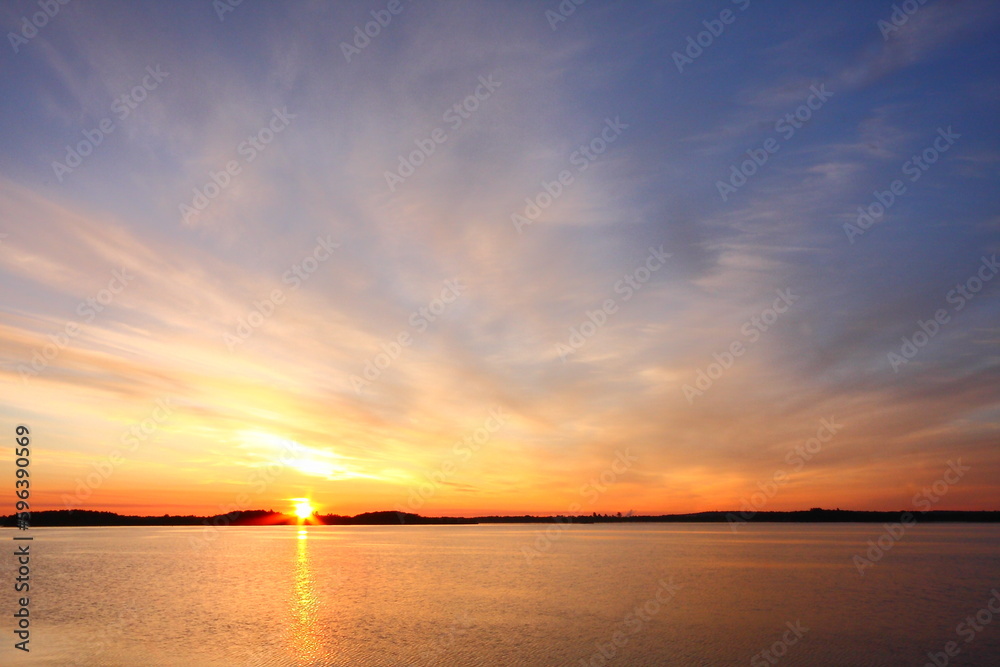Sunset over a calm lake