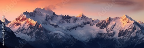 Wallpaper Mural A captivating mountain range with snow-capped peaks reflecting the glow of a ris