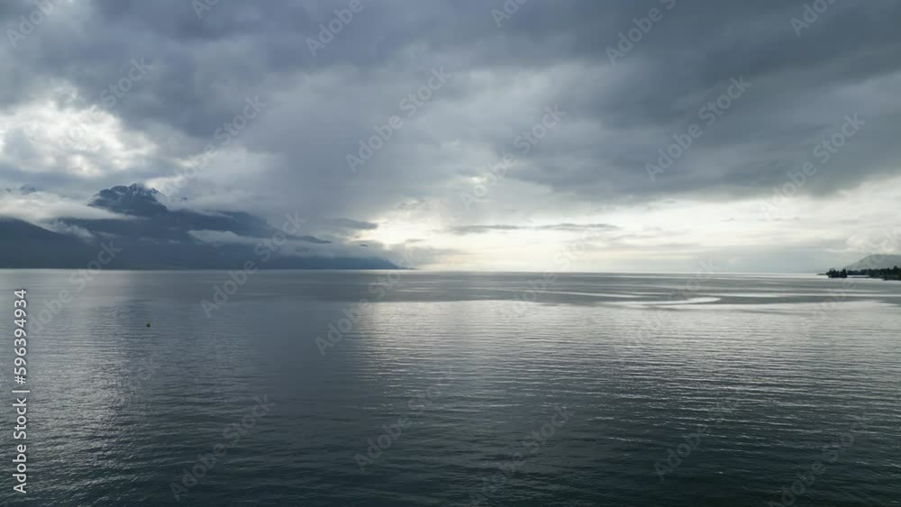 Dramatic sky over Lake Leman in Switzerland - aerial view by drone Dramatic sky over Lake Leman in Switzerland - aerial view by drone