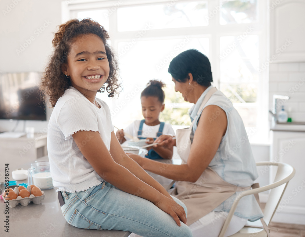 Ready to make grandma proud. Shot of a mature woman baking with her granddaughters.