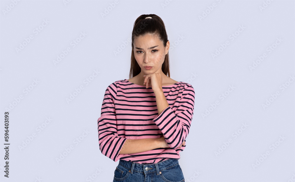 Sceptical attractive young woman looking at camera Sceptical attractive young woman looking at camera