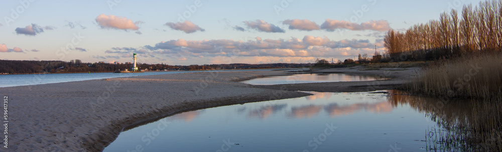 Panoramic view to Falckenstein beach with lighthouse and Kiel fjord at the baltic sea.