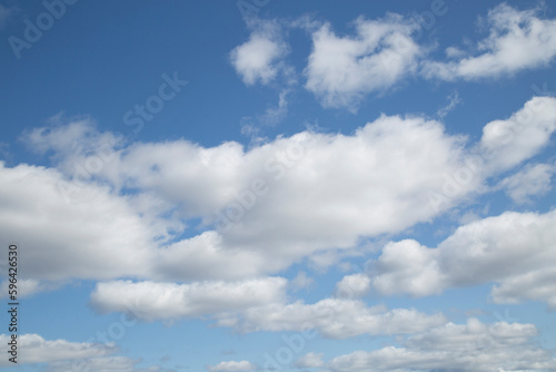 Blue sky with clouds.Sky background with summer clouds. © Александр Поташев