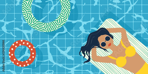 Young girls floating on air mattresses in blue pool water