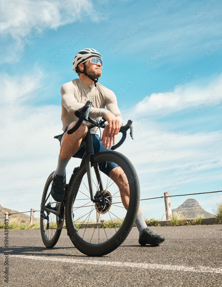 Sometimes you just gotta stop and admire the view. Full length shot of a handsome mature man taking a break while cycling outdoors. Sometimes you just gotta stop and admire the view. Full length shot of a handsome mature man taking a break while cycling outdoors.