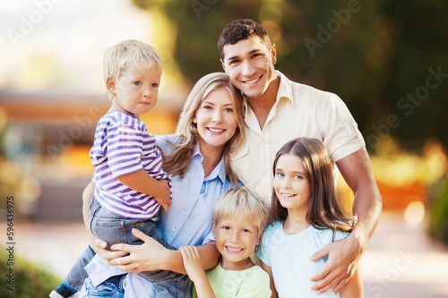 Beautiful portrait of a happy young family with child