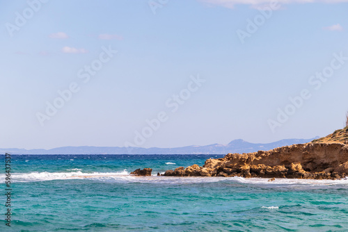 Sea view, turquoise blue sea water and rock. A beautiful blue lagoon on the coast