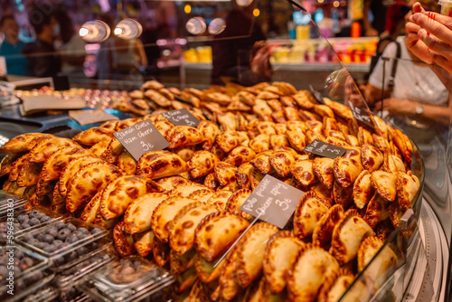 Delicious breads in a beautiful Spanish bakery. Different types of bread on bakery shelves. Barcelona - Catalonia - Spain. High quality photo