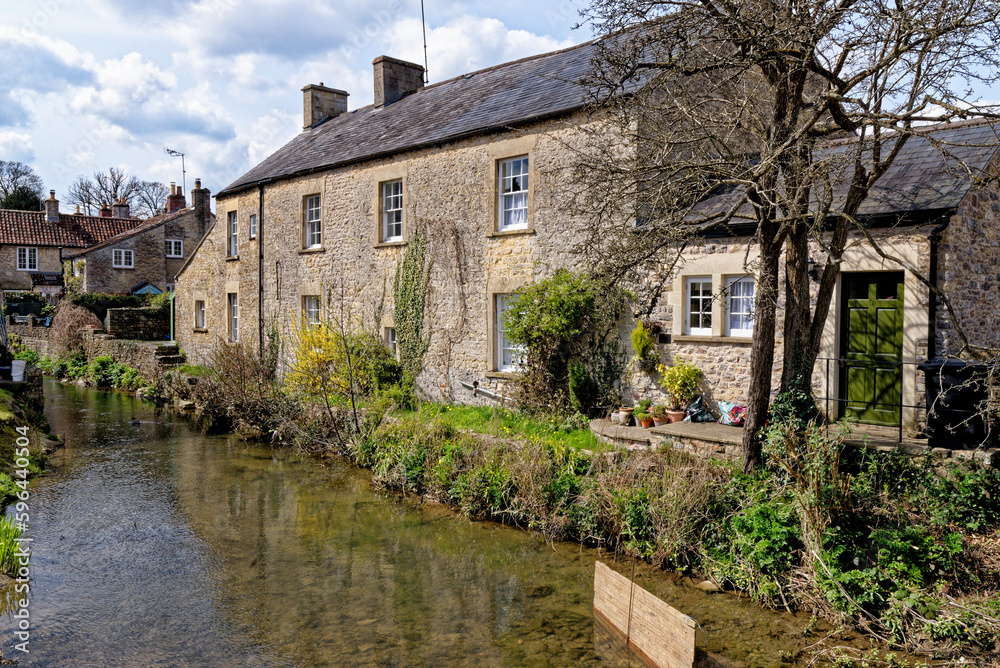 Pretty cottages and the Mells River at Nunney