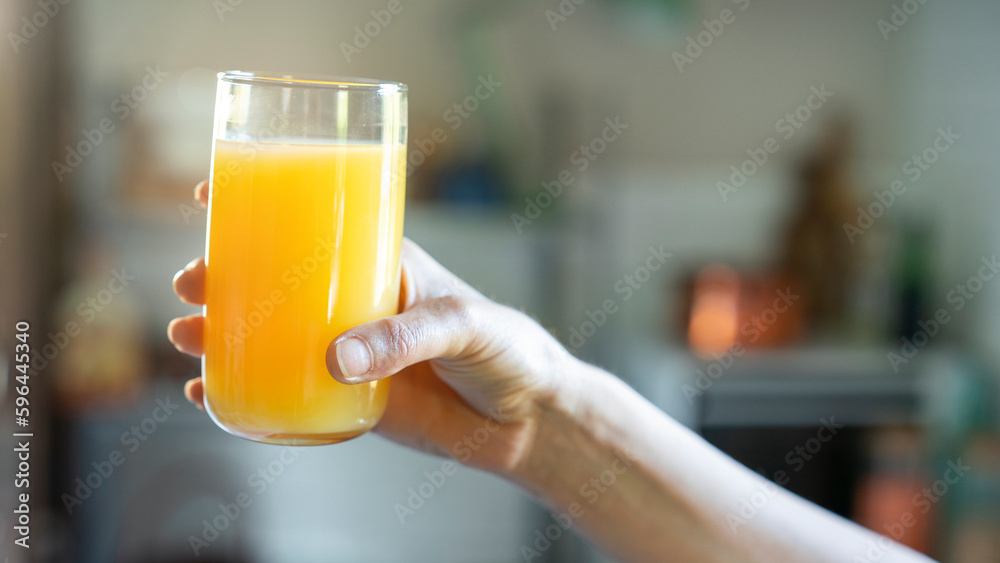 Young woman drinking orange juice Young woman drinking orange juice